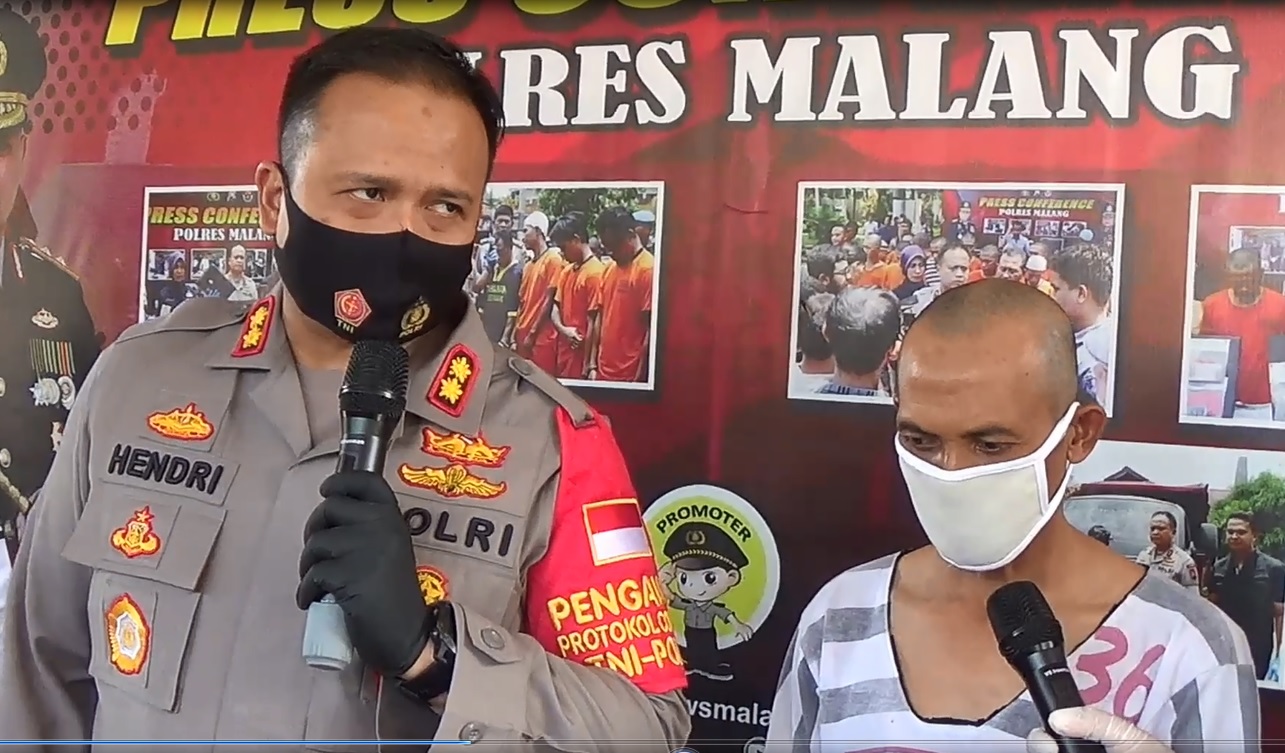 Kapolres Malang, AKBP Hendri Umar saat gelar perkara kasus pencabulan yang dilakukan NS dengan korban anak kandung sendiri. (foto/metrotv)