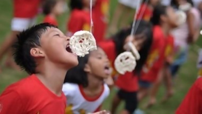 Ilustrasi lomba makan kerupuk (foto/MI)