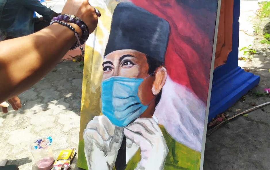 Lukis Pahlawan Bermasker dalam Perang Melawan Covid