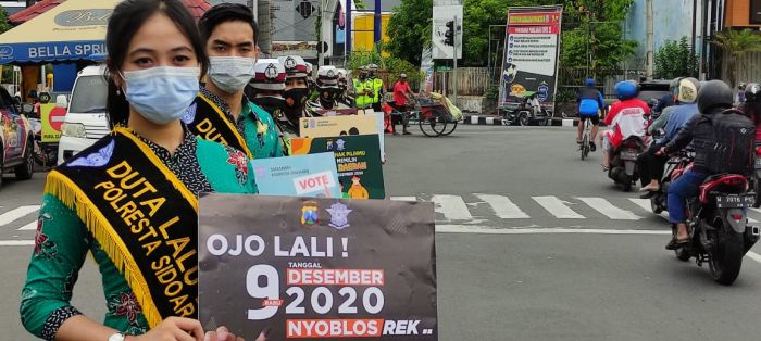 Sosialisasi Pilkada dilakukan Duta Lalu Lintas Sidoarjo. (metrotv)