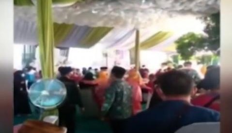 Video viral menunjukkan pesta pernikahan anak anggota DPRD Jatim viral lantaran diduga melanggar prokses (Foto / Metro TV)