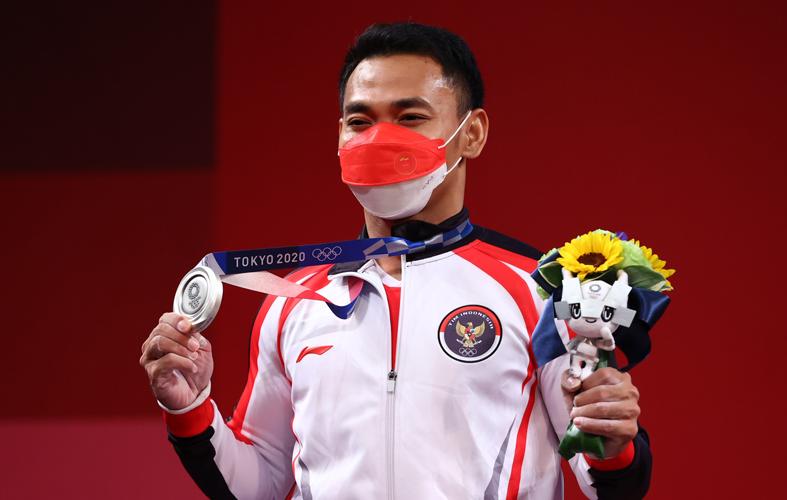 Eko Yuli Irawan memperoleh medali perak dalam Olimpiade Tokyo 2020 (Foto / Istimewa)