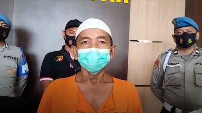 Tersangka Sukisno ditangkap setelah membunuh istrinya (Foto / Metro TV)