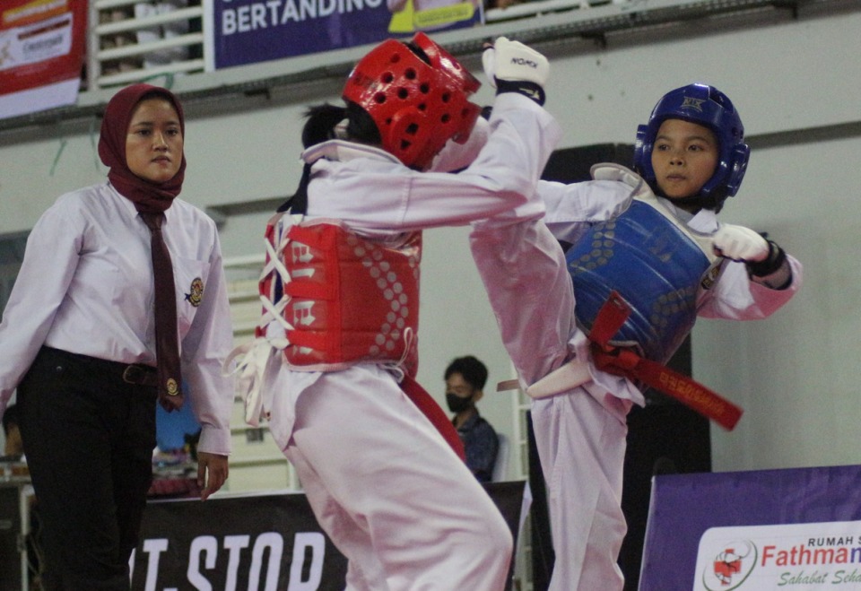 Peserta taekwondo sedang beradu keterampilan (Foto / Metro TV)